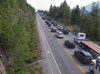 Cars line up along the Sea to Sky Highway after a closure on Tuesday afternoon.