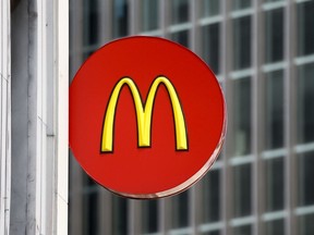 FILE - A McDonald's sign at a restaurant in downtown Pittsburgh, April 24, 2017.