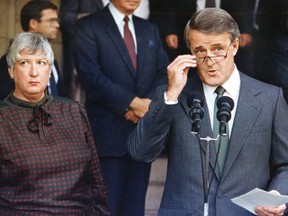 Prime Minister Brian Mulroney, along with Trade Minister Pat Carney, makes a statement after a day of briefing premiers on the state of the North American trade talks in this Sept. 14, 1987 file photo in Ottawa. Carney, a former member of Parliament, a senator and a trailblazer, died Tuesday at the age of 88.