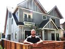 Bel Dadwal, whose company Four Corners Homes specializes in duplexes, fourplexes and the like in front of an east Vancouver development with three strata units that was built by his firm.
