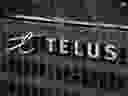 The Telus Corporation logo is seen on the outside of the company's headquarters in downtown Vancouver, on January 19, 2023.
