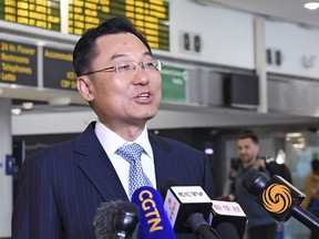 FILE - In this photo released by Xinhua News Agency, Xie Feng, China's new ambassador to the United States, speaks to the media upon his arrival at the John F. Kennedy International Airport in New York on May 23, 2023. China does not want a trade war with the United States but will retaliate against any further U.S. restrictions on technology and trade, the Chinese ambassador to the U.S. said Wednesday, July 19.