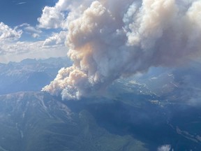 A handout photo from the BC Wildfire Service shows a wildfire in southeastern British Columbia that has charred three square kilometres and is threatening more than 1,000 properties, including a ski resort, west of Invermere.