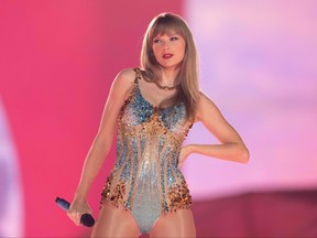 Taylor Swift performs onstage on the first night of her Eras Tour at AT&T Stadium in Arlington, Texas, on March 31, 2023.