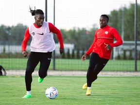 Sam Adekugbe, left, and Richie Laryea are teammates on the Canadian national team. And now, thanks to some deadline dealing by Whitecaps CEO Axel Schuster, they are club teammates, too.