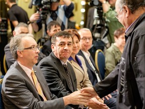 John Rustad greets an attendee at a 2014 revenue-sharing agreement signing for development of LNG export facilities at Grassy Point near Prince Rupert, with the Lax Kw'alaams and Metlakatla First Nations.