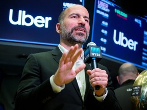 Dara Khosrowshahi, chief executive officer of Uber Technologies Inc., speaks on a webcast during the company's initial public offering (IPO) on the floor of the New York Stock Exchange (NYSE) in New York, U.S., on Friday, May 10, 2019.