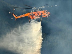 Rotary-wing aircraft is being used regularly on the Horsethief Complex of fires near Invermere, B.C. as shown in this undated handout image.