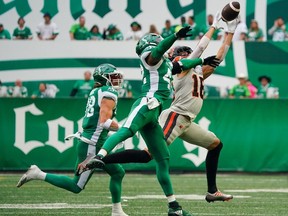 BC Lions receiver Justin McInnis (18) attempts a catch against Saskatchewan Roughriders during the first half of CFL football action in Regina, on Sunday, August 20, 2023.