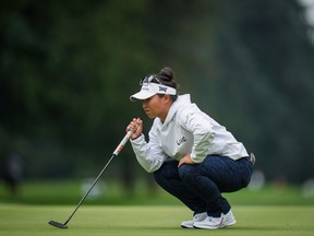 Megan Khang, of the U.S., lines up a putt on the 18th hole during the second round at the LPGA CPKC Canadian Women's Open golf tournament, in Vancouver Aug. 25, 2023.