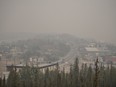 Heavy smoke from nearby wildfires fills the sky in Yellowknife on Tuesday, Aug. 15, 2023.