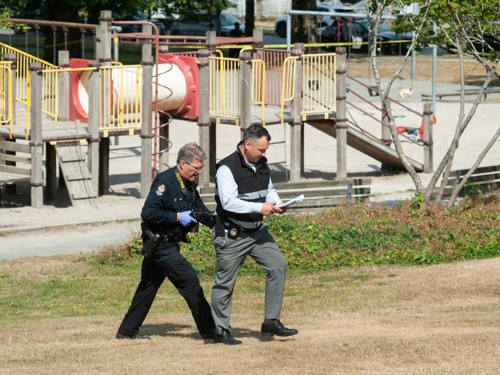 Police officers involved in a 2023 fatal shooting of a teen in east Vancouver's Clinton Park have been cleared of wrong doing after an independent review found that the officers legitimately feared for their lives when they fired more than 20 rounds. Vancouver police and IIO investigators are pictured at the scene of the fatal shooting at Clinton Park in east Vancouver in this file photo from Aug. 5, 2023.