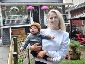 VANCOUVER, BC., July 24, 2023 - Lisa McCormick with her son Gio at the Douglas Park Academy daycare in Vancouver, B.C. on July 24, 2023. City Hall has their application to expand their in-home daycare operation. (NICK PROCAYLO/PNG) 00101789A [PNG Merlin Archive]
