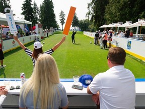 Golfers tee off at the 17th hole where there's a makeshift ice arena style area with boards and dashers at Shaughnessy Golf Club in Vancouver Aug. 24, 2023.