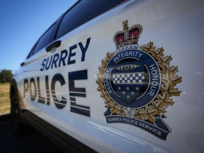 The Office of British Columbia's Police Complaint Commissioner has ordered a review of the case of a Surrey Police Service officer it says asked to be let off when he was caught driving while impaired. A Surrey Police crest is seen on the side of one of the force's vehicles in Surrey, B.C., on July 19, 2023.