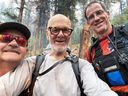 Rescued hiker Bernard Cloutier, centre, of Penticton took this selfie with his heroes from Penticton Search and Rescue, Ron Berlie, left, and Norm Cole just before being airlifted out of the Crater Creek wildfire region in Cathedral Park.