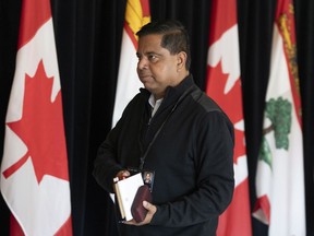 Minister of Crown-Indigenous Relations Gary Anandasangaree walks past members of the media during the Liberal Cabinet retreat in Charlottetown, Tuesday, Aug. 22, 2023.&ampnbsp;Canada changed the way it settles First Nation land claims, Crown-Indigenous Relations and Northern Affairs Canada confirmed Friday.