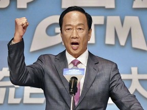 Terry Gou, the billionaire founder of Foxconn, speaks during a press conference in Taipei, Taiwan Monday, Aug. 28, 2023. Gou declared Monday that he will run as an independent candidate for president in Taiwan's 2024 election, ending months of speculation. (Kyodo News via AP)