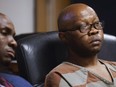 Accused killer Billy Chemirmir, right, listens to victim impact statements alongside defense lawyer Kobby Warren during his trial at Frank Crowley Courts Building in Dallas on Friday, Oct. 14, 2022.