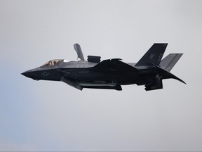 A United States Marine Corps F-35B Lightning II takes part in an aerial display during the Singapore Airshow 2022 at Changi Exhibition Centre in Singapore, Feb. 15, 2022.