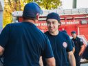 Canucks captain Quinn Hughes and Canucks president Jim Rutherford paid a visit to West Kelowna firefighters on Sept. 15, 2023. Photo: Vancouver Canucks