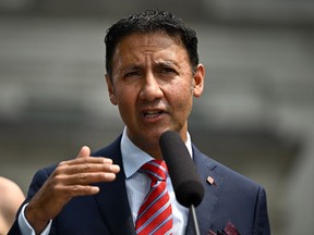 Minister of Justice and Attorney General of Canada Arif Virani speaks during a media availability after a cabinet swearing-in ceremony at Rideau Hall in Ottawa, on Wednesday, July 26, 2023.