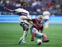 Vancouver Whitecaps' Ali Ahmed battles with Colorado Rapids' Michael Barrios during their meeting at B.C. Place earlier this year. Ahmed, now recovered from a concussion, has been called up to represent Canada. He'll join the team after Wednesday's game against Colorado.