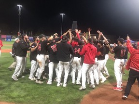 Vancouver Canadians celebrate wining the Northwest League title Saturday night at Nat Bailey Stadium. It's the franchise's fifth crown since 2011.