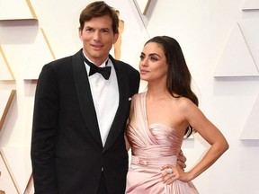 Ashton Kutcher and Mila Kunis attend the 94th Oscars at the Dolby Theatre in Hollywood, Calif., on March 27, 2022.