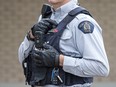 A jury in a coroner's inquest into the police killing of a B.C. man eight years ago says the province and the RCMP should speed up the introduction of police body cameras. An RCMP officer wears a body camera in Bible Hill, N.S. on Sunday, April 18, 2021.