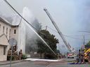 Firefighters battle a blaze at Cross Connection Church in Chilliwack on Monday.