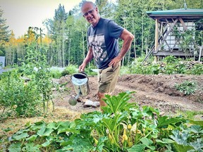 Quadra Island resident Bernie Amell hand-waters his garden during a provincewide drought. He is part of a team of local volunteers striving to develop water security for the community.