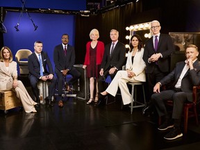 This image released by CBS News shows, from left, Sharyn Alfonsi, L. Jon Wertheim, Bill Whitaker, Lesley Stahl, Scott Pelley, Cecilia Vega, Anderson Cooper and Executive Producer Bill Owens, from the CBS news series "60 Minutes."