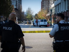 A police road block is seen on Glen Drive after a shooting involving RCMP officers in Coquitlam B.C. on Friday, September 22, 2023. The death of a Metro Vancouver RCMP officer who was shot dead while executing a search warrant is reverberating with law enforcement officials across the country.