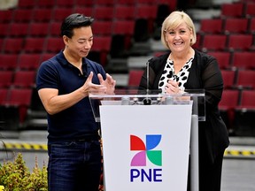 PNE CEO Shelley Frost (right) and Vancouver Mayor Ken Sim (left) assisted with the pulling of the winning ticket for the 2023 PNE Prize Home on Monday, Sept. 11, 2023.