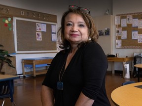 Teacher Morena de Alfaro inside Our Lady of Sorrows school in Vancouver.