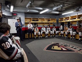 Drew Scott of Property Brothers fame, who's now a minority owner of the Vancouver Giants, talks to the players before their season opener on Friday.
