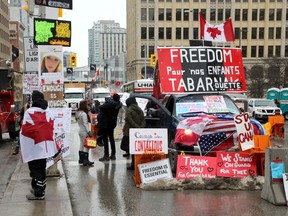 Participants in the convoy protest on a blocked section of Wellington Street in downtown Ottawa on Feb. 10, 2022.