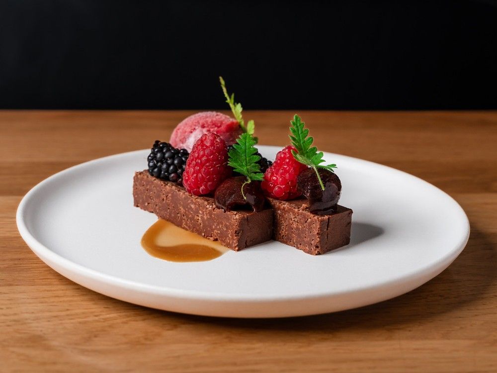 Chocolate Ganache with Nutella Feuilletine Crust and Caramel Sauce.