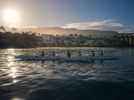 With the sun rising over Maui, early morning paddlers pass the Fairmont Kea Lani. The end of the Covid pandemic has seen a number of Wailea resorts, including Kea Lani, to step up their efforts in preserving the island's stunning environment.