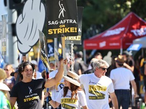 Striking SAG-AFTRA members and supporters picket outside Disney Studios on day 95 of their strike against the Hollywood studios on October 16, 2023 in Burbank, California.