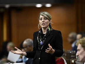 Minister of Foreign Affairs Mélanie Joly rises during Question Period in the House of Commons on Parliament Hill in Ottawa on Thursday, Oct. 19, 2023.