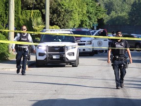 Police at the scene of Mir Aali Hussain's murder in Coquitlam on May 22, 2021.