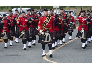 Approximately 5000 RCMP, police, military and emergency services personnel attend the funeral for slain RCMP member Const. Rick O'Brien, at the Langley Events Centre in Langley, BC Wednesday, October 4, 2023.