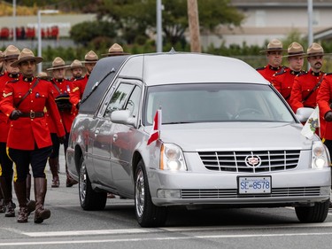 Const. Rick O'Brien is honoured at a regimental funeral at the Langley Event Centre in Langley, BC., October 4, 2023.