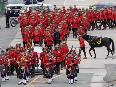 Const. Rick O'Brien is honoured at a regimental funeral at the Langley Event Centre in Langley, BC., October 4, 2023.