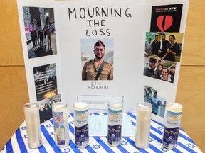 Photos on display of Ben Mizrachi at King David Secondary School in Vancouver. Mizrachi was killed when Hamas gunmen attacked a music festival in southwestern Israel.