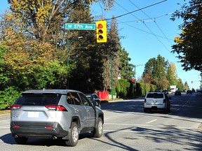 A car runs a red light at Oak and 57th Avenue, which captured 5,251 speeders and 1,762 red light violations in 2022.