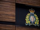 Mounties in Ashcroft, B.C., say a fiery head-on crash between two tractor trailers has claimed the life of one of the drivers. The RCMP logo is seen outside Royal Canadian Mounted Police 