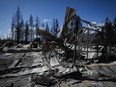 The burned remains of the Scotch Creek-Lee Creek fire department and community hall are seen in Scotch Creek, B.C., on Wednesday, September 6, 2023. British Columbia's forest watchdog has confirmed it is investigating the province's response to wildfires that ripped through small communities on the shores of Shuswap Lake in August, destroying or damaging more than 200 properties.THE CANADIAN PRESS/Darryl Dyck